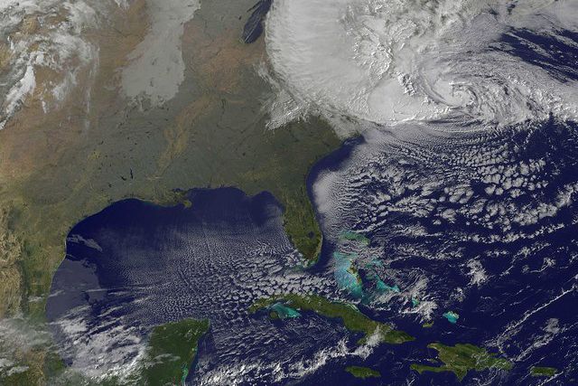 NOAA's GOES-13 satellite captured this visible image of Hurricane Sandy battering the U.S. East coast this morning at 9:10 a.m.